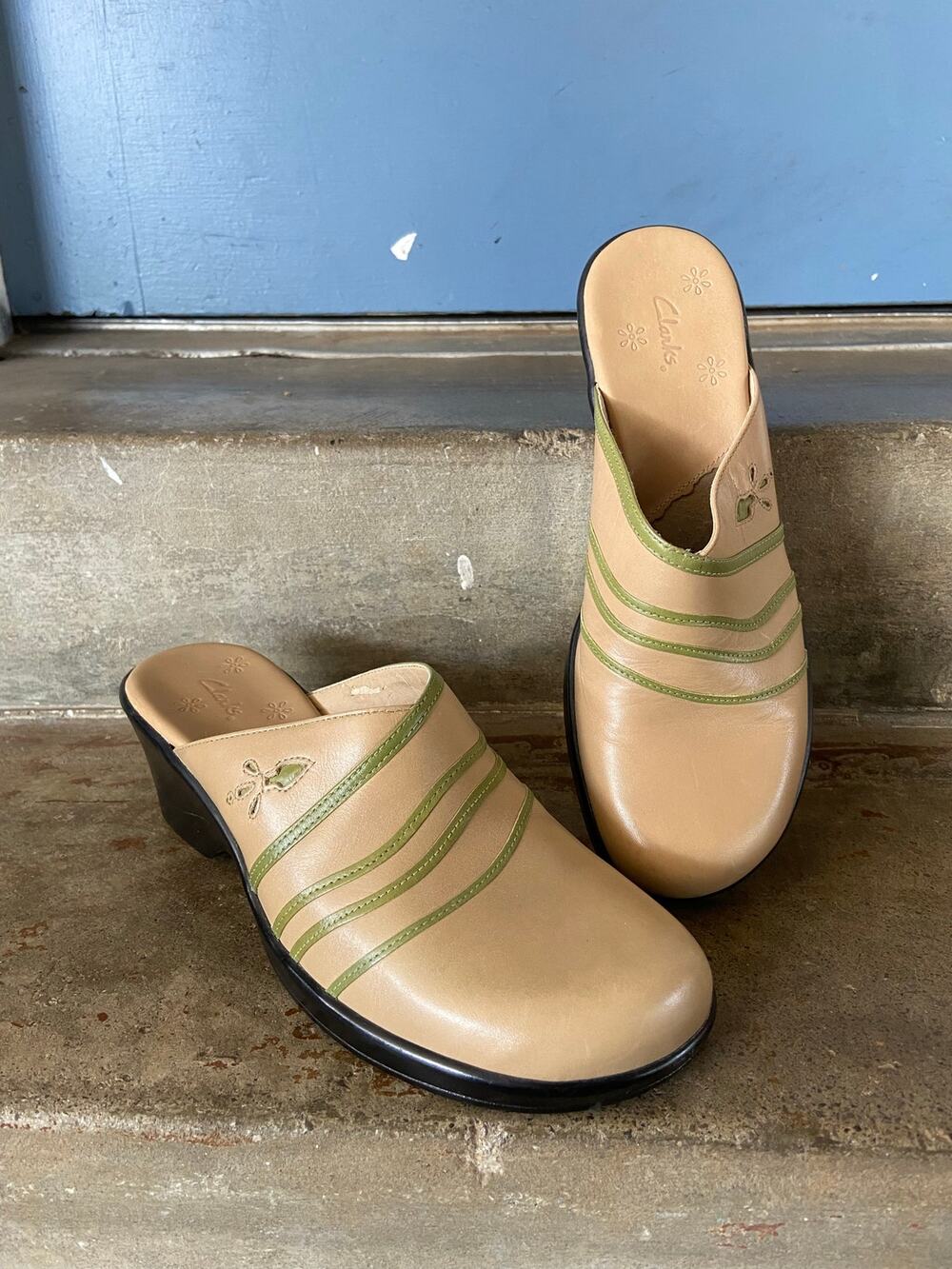 Vintage Clarks beige clogs with citron green trim and floral cut outs.